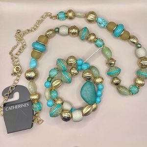 Catherine’s gold necklace and bracelet with turq, gold, and white gemstones. NWT